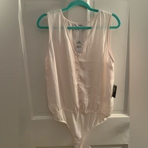 White (almost pale pink hue) bodysuit with buttons NWT